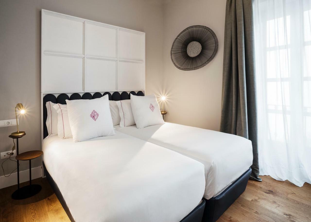 Apartamentos One Shot Conde De Torrejon Seville Exterior photo
