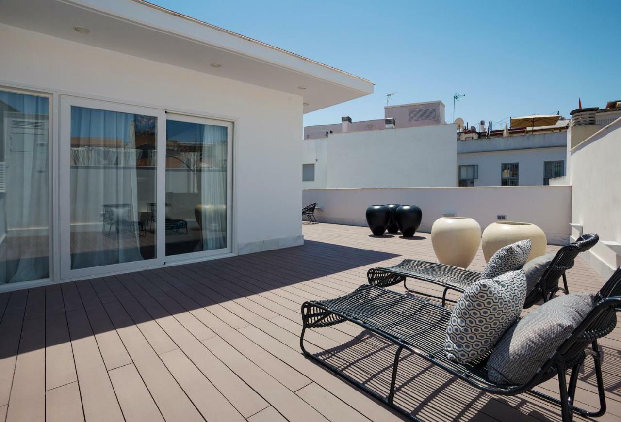 Apartamentos One Shot Conde De Torrejon Seville Exterior photo